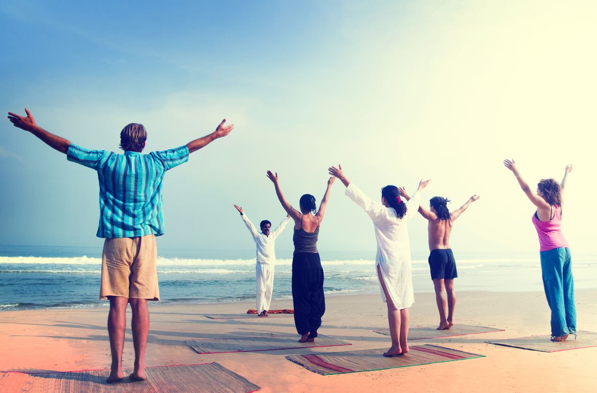 Esercizi yoga sulla spiaggia